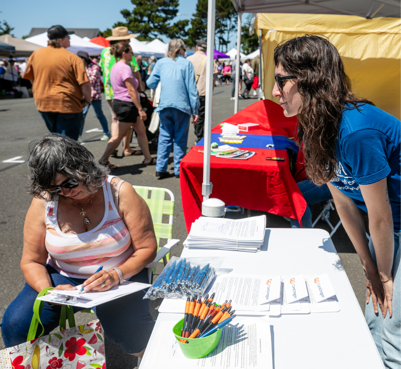 Community member fills out a survey for the Columbia Pacific CCO Regional Health Assessment.  